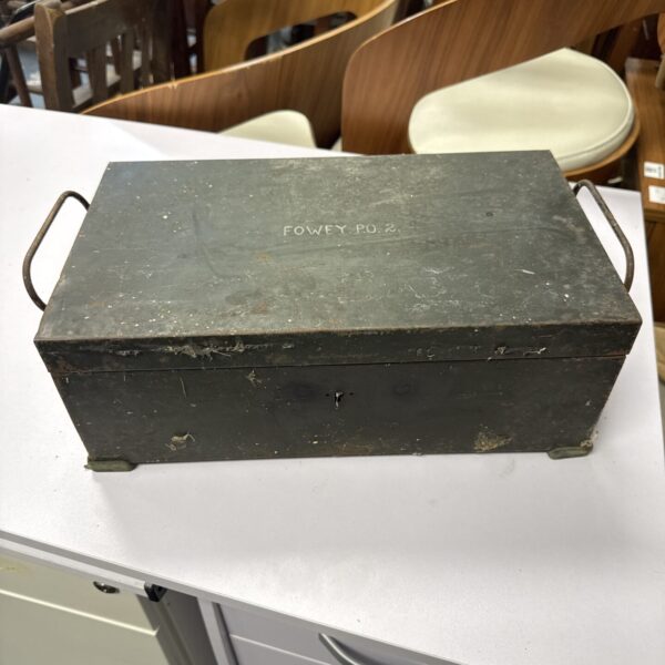 Vintage metal storage box with aged patina.