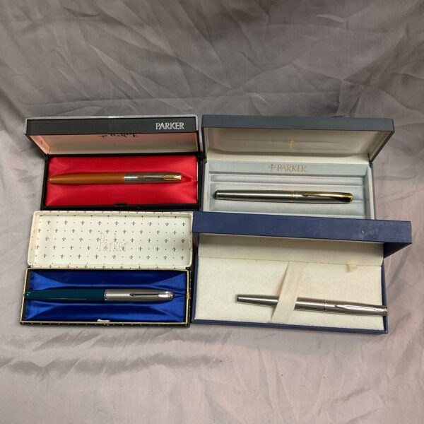 Vintage Parker and Waterman fountain pens in a lot.