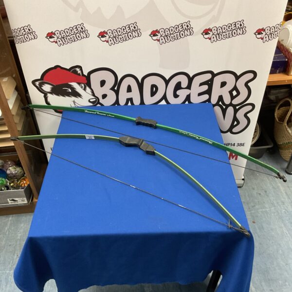 Vintage Sherwood Forest Barnett bow set for archery enthusiasts.