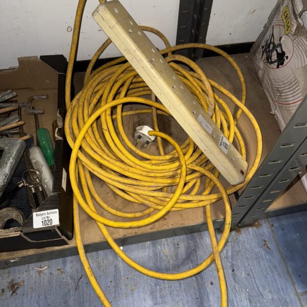 Long cable extension lead with six sockets for workshop or garden use.