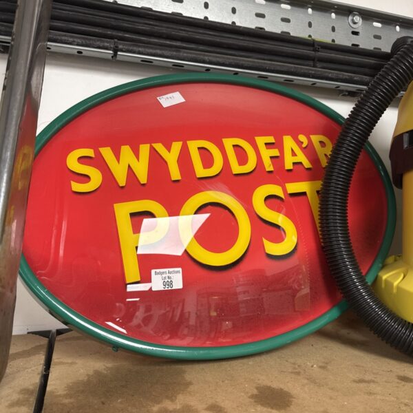 Vintage Welsh Post Office enamel sign with bold lettering.