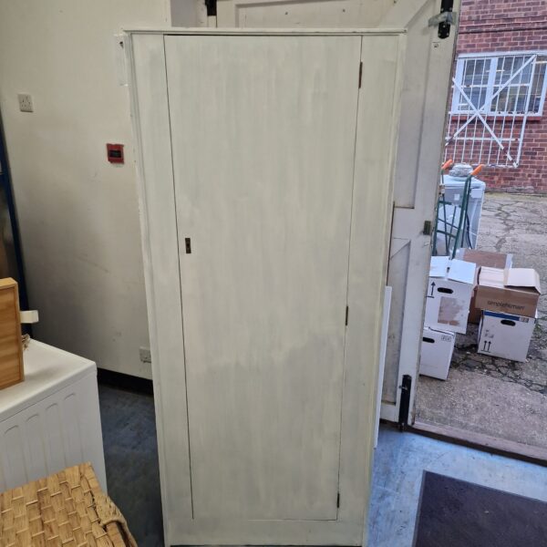 White painted vintage cabinet for storage and display.