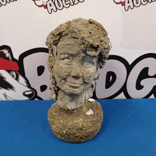 Reconstituted stone bust of a young child for garden or home decor.