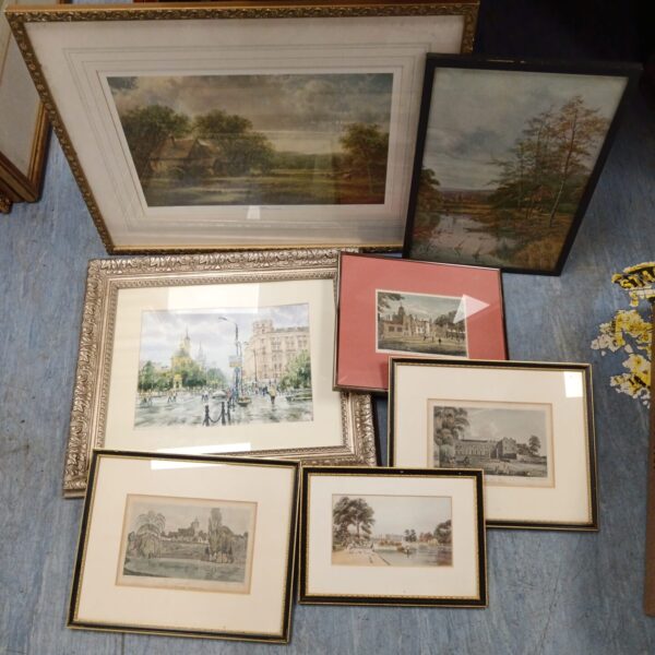 Selection of framed landscape prints for vintage home decor.
