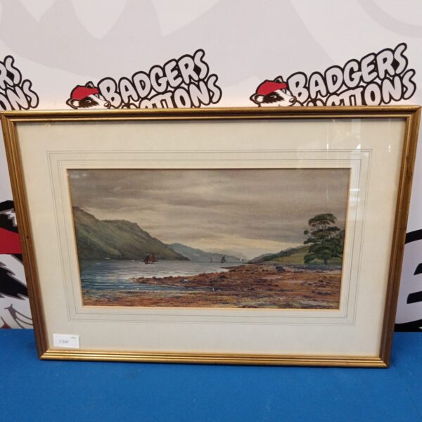 Gilt framed watercolour painting of Loch Levy with sailboats.
