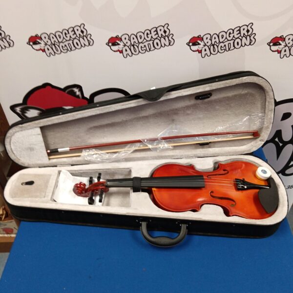 4/4 violin with bow inside a protective case.