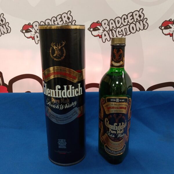 Vintage Glenfiddich Scotch Whisky bottle in original packaging.