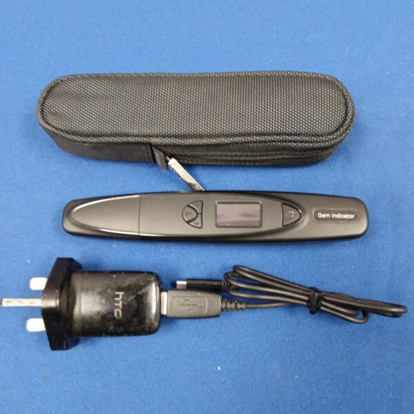 Presidium gem stone tester in protective carrying case.
