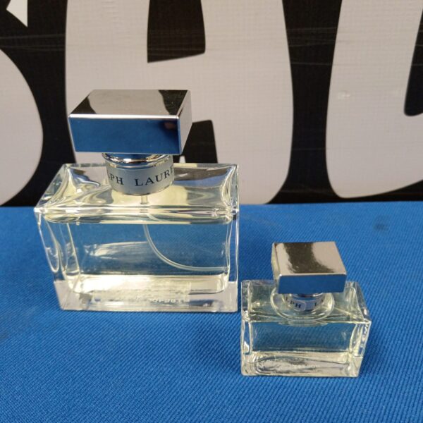 Vintage Ralph Lauren Romance perfume bottle, clear glass design.