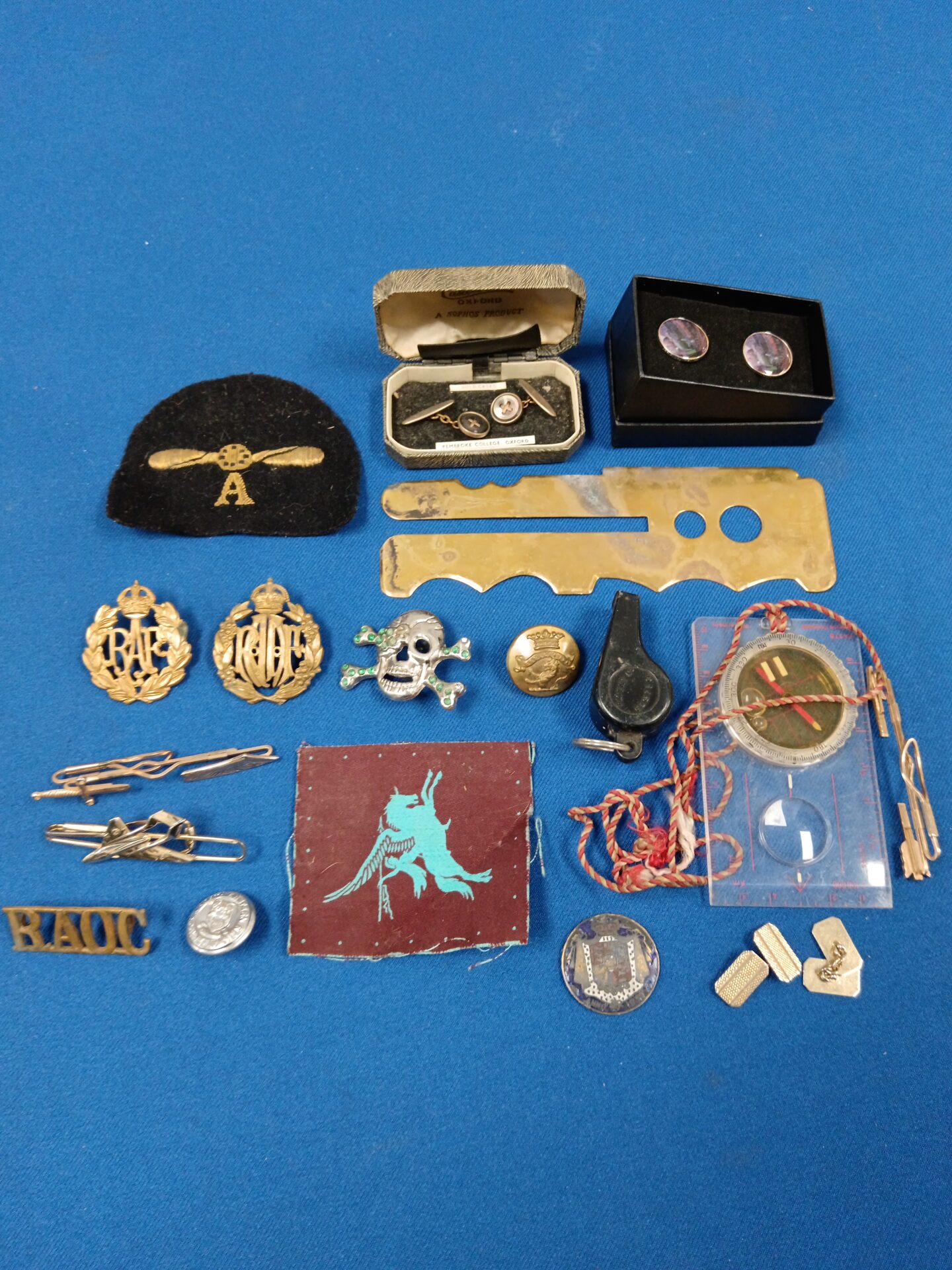 763 Tub of mixed military related items including badges