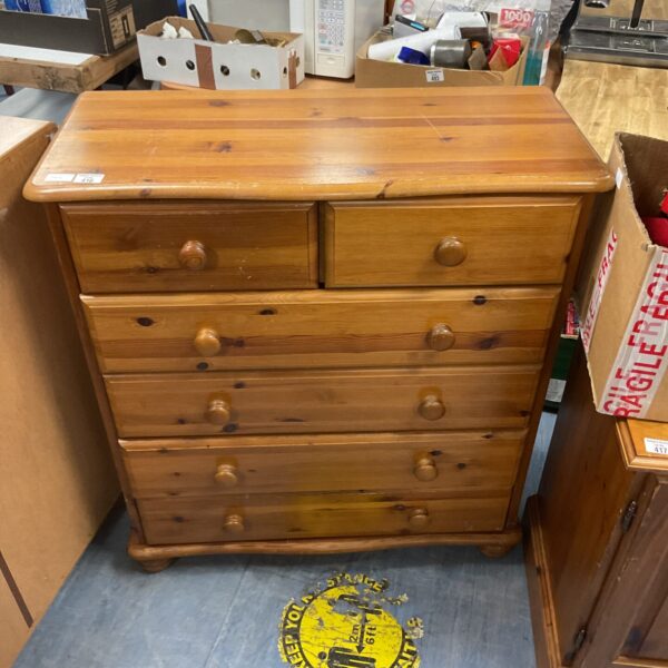 Vintage pine chest of drawers with two over three drawers.