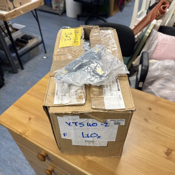 Stack of 40 Global Industrial xts40-2 shop light fittings.