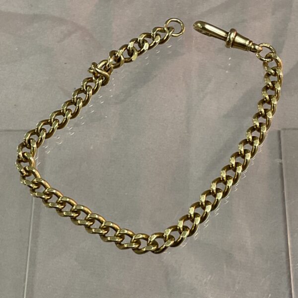 Vintage 9ct gold bracelet with a classic curb chain design.