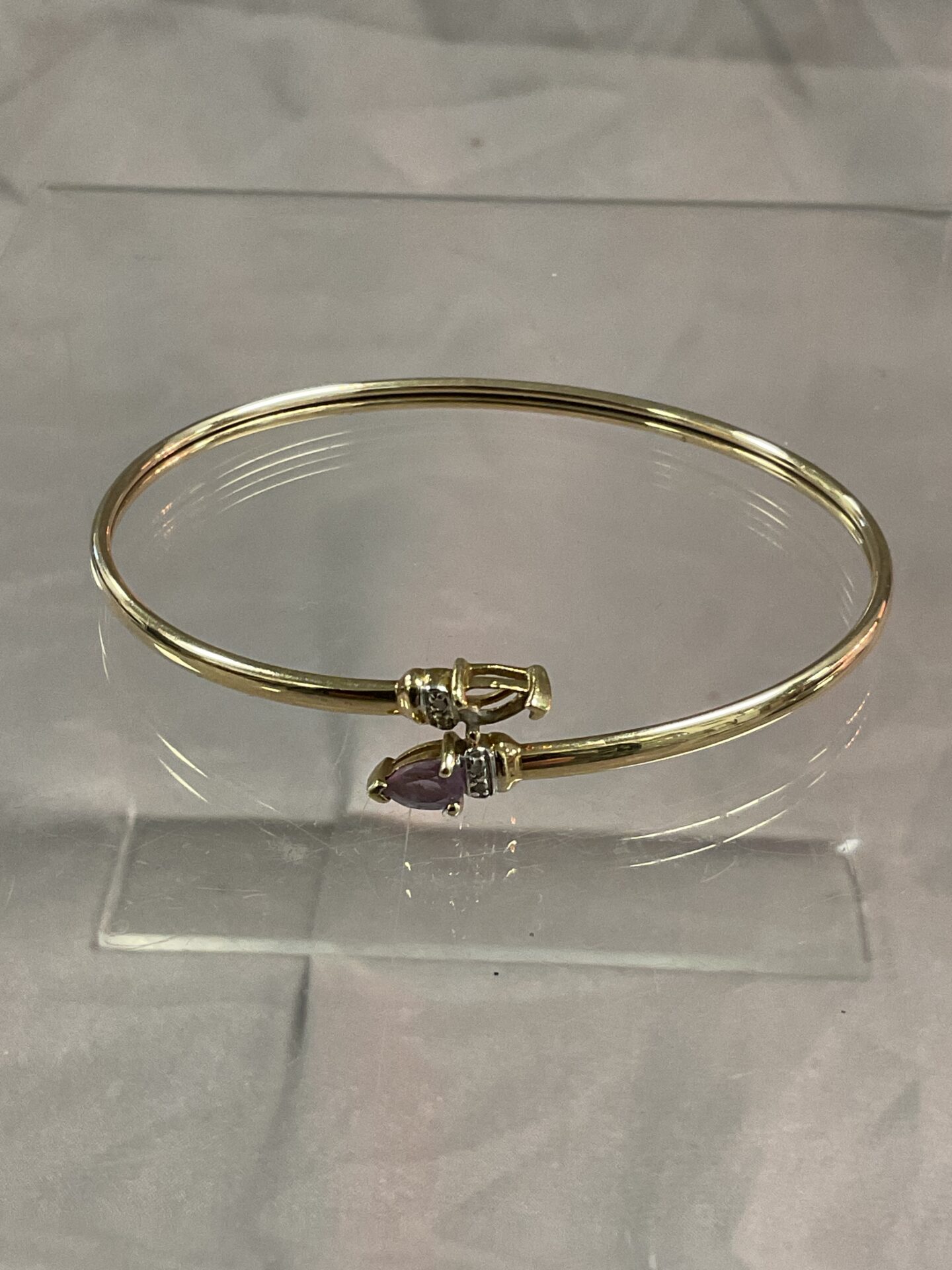 943 9ct gold diamond and amethyst set bracelet 4.97g gross missing one amethyst