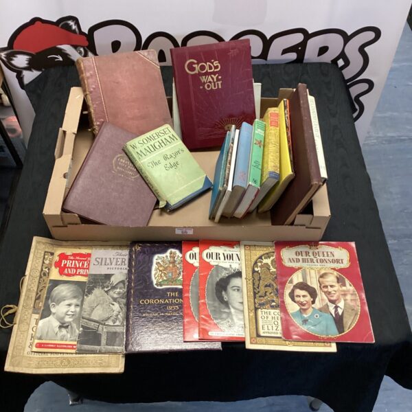 Vintage book collection featuring Somerset Maugham's "The Razor's Edge".