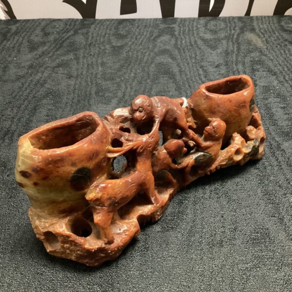 Antique Chinese carved brush pot with monkeys and deer design.