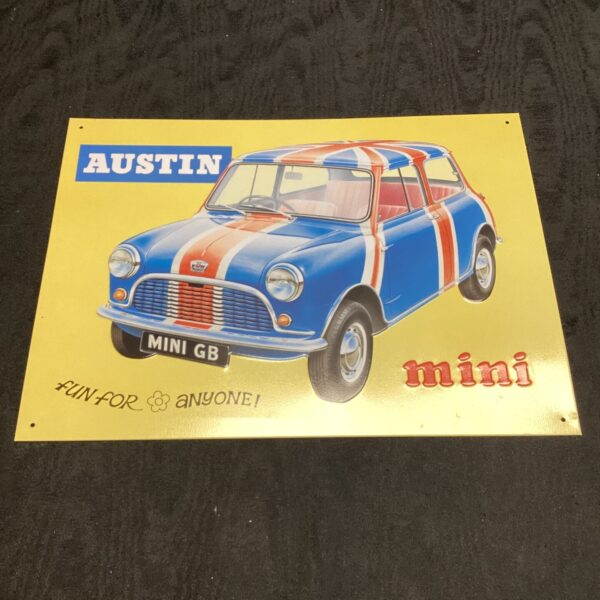 Vintage Austin Mini tin sign, classic British car advertising.
