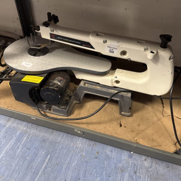 White Axminster fret saw for detailed woodworking projects.
