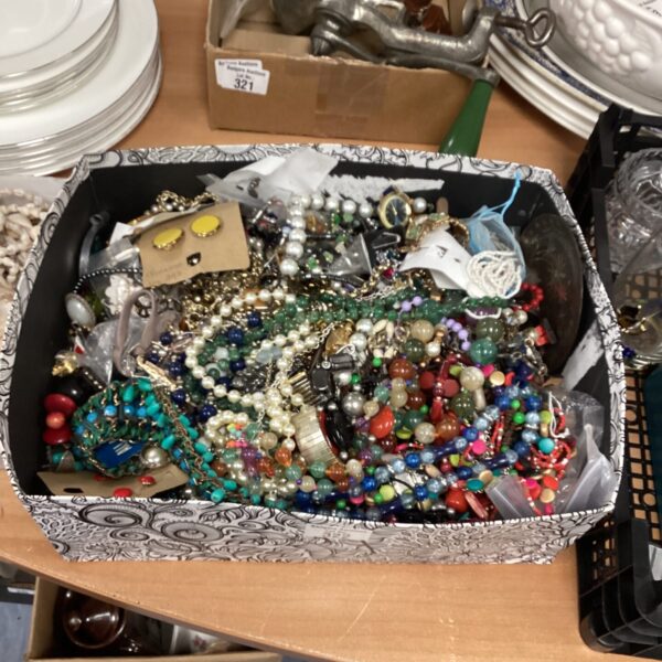 Colourful costume jewellery lot with beads and necklaces.