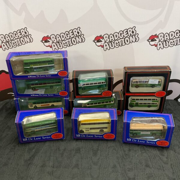 Boxed De Luxe Series diecast models, vintage collectible toys.