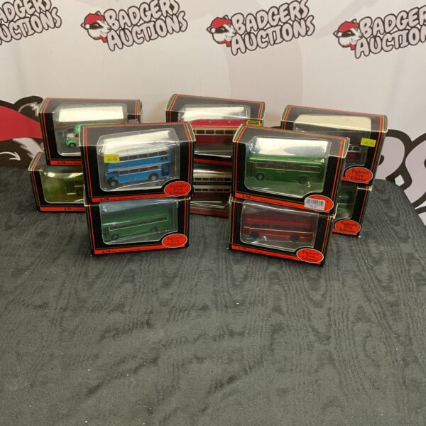 Lot of Gilbow diecast buses in original packaging.