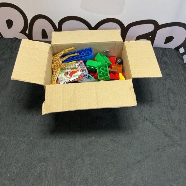 Lego Duplo farm animals and building blocks in a box.