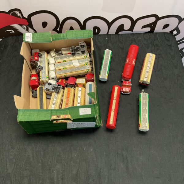 Box of assorted diecast trucks from Majorette, Corgi and Matchbox.