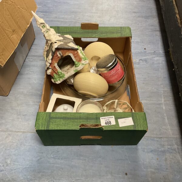 Mixed candle lot with various holders and scented candles.