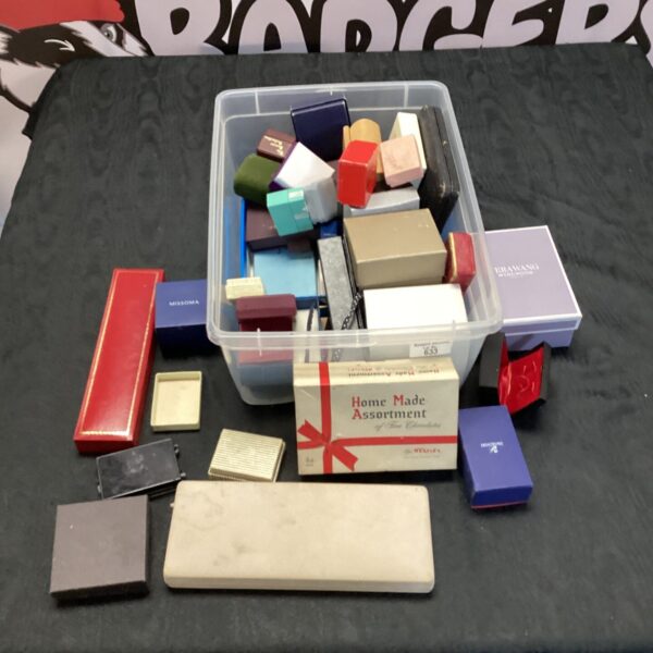 Mixed lot of vintage jewellery and chocolate boxes, including Nestle packaging.