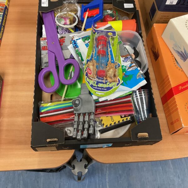 Mixed toy lot with assorted prank and novelty items.