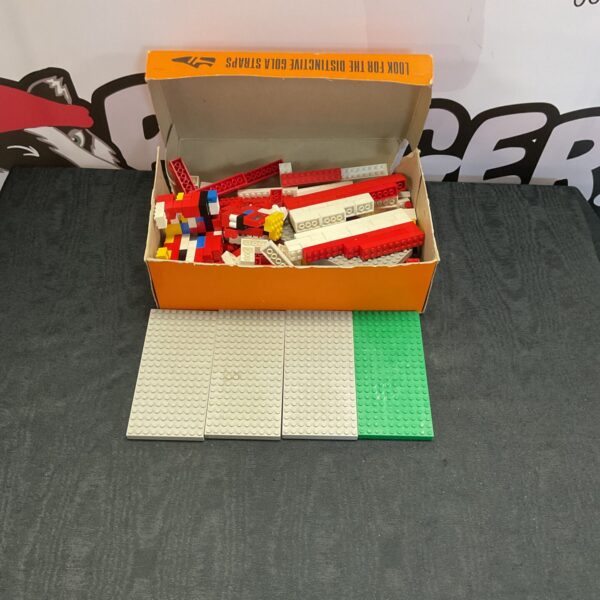 Vintage Lego lot with colourful bricks and building blocks.