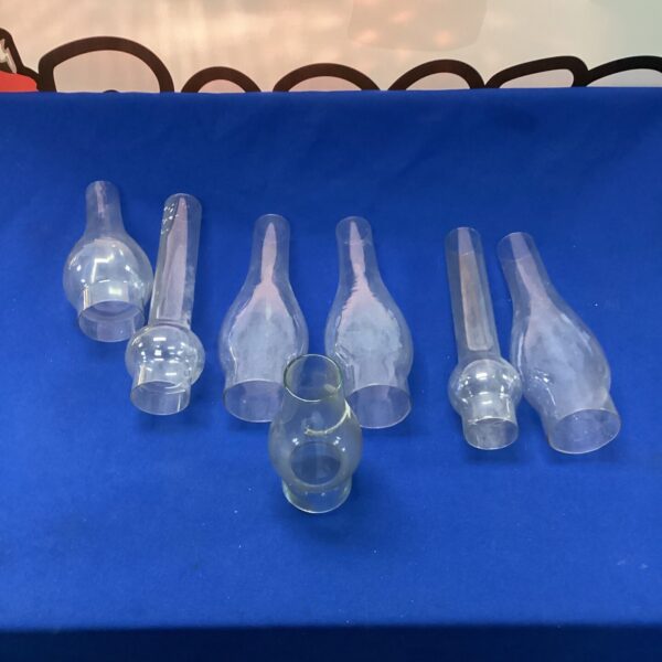 Lot of clear glass oil lamp shades for vintage lamps.