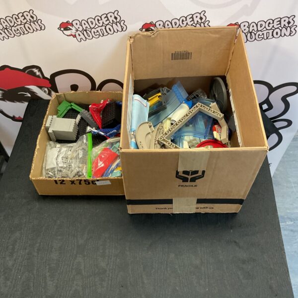 Mixed lot of Playmobile and Lego compatible building bricks for creative play.