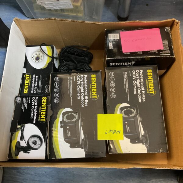 Sentient CCTV camera lot with accessories in a cardboard box.