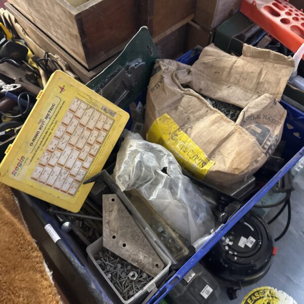 Shed clearance lot with nails and o-ring set for DIY projects.