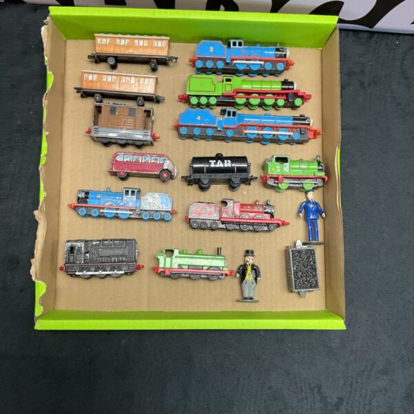 Vintage ERTL Thomas the Tank Engine lot with figures and Fat Controller.