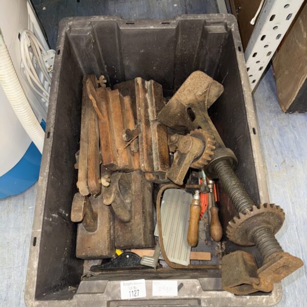 Vintage tools lot including wood planes and hand tools.