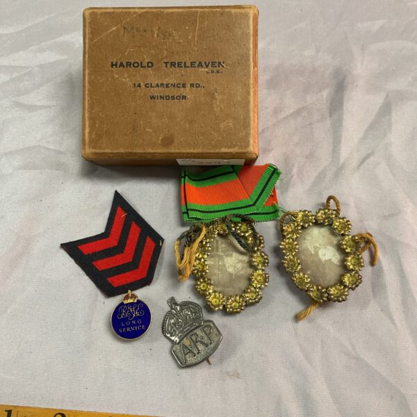 Vintage ARP and Long Service badges with miniature frames.
