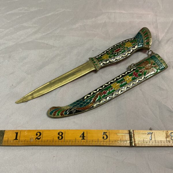 Vintage brass letter opener with colourful enamel detailing.
