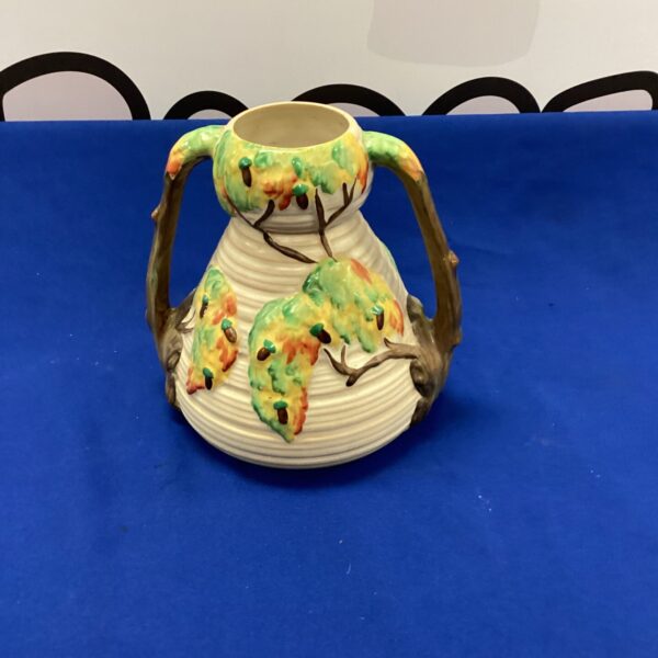 Vintage Carltonware pottery vase with hand-painted floral design.