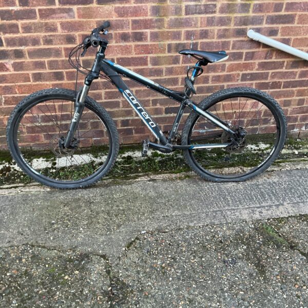 Dark coloured Carrera Vengeance mountain bike for sale.