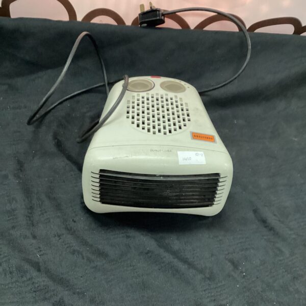 Vintage Challenge 2kw fan heater for portable warmth.