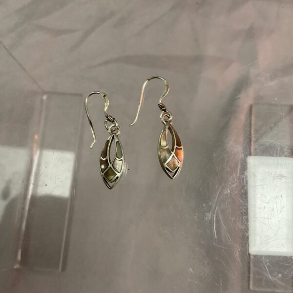 Silver earrings inspired by Charles Rennie Mackintosh’s Glasgow School style.