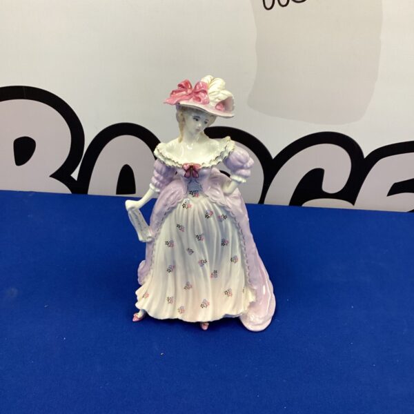 Antique Coalport Mrs Fitzherbert figurine, delicate Victorian porcelain collectible.