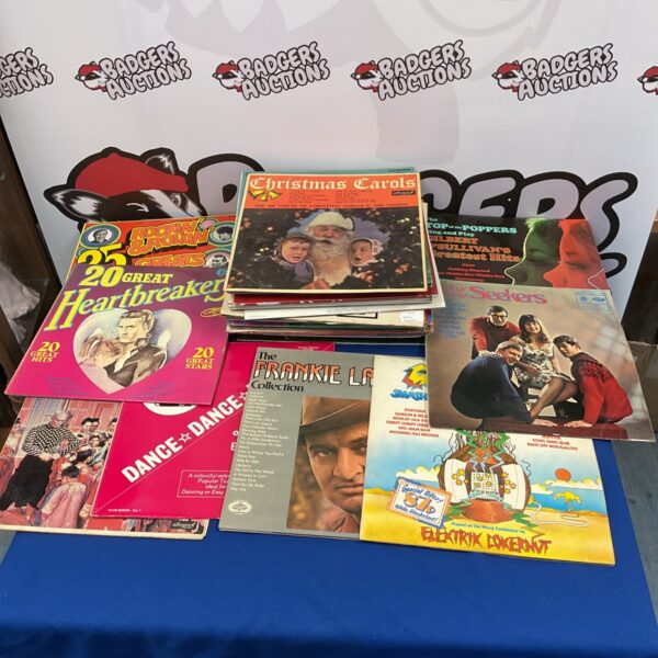 Vintage vinyl record collection lot with various artists and genres.