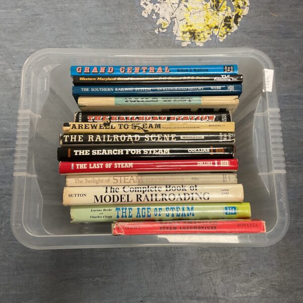 Vintage collection of American railroad books for collectors.