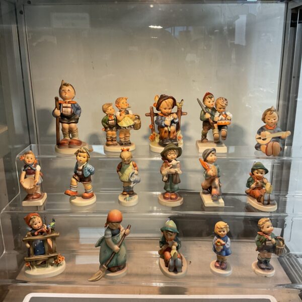 Vintage Hummel Goebel figures collection, charming porcelain figurines.