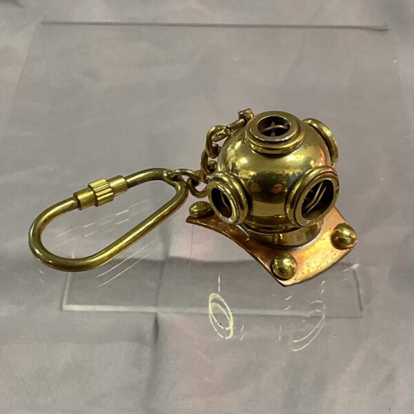 Detailed brass divers helmet keychain for collectors.