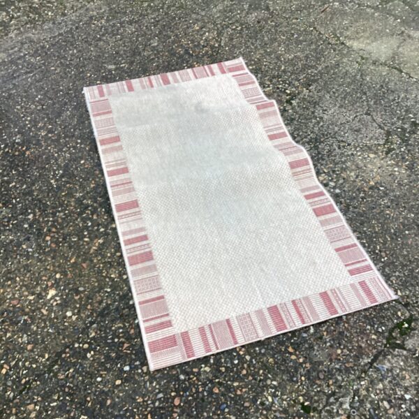 Vintage Crossley rug, woven hallway runner with repeating pattern.