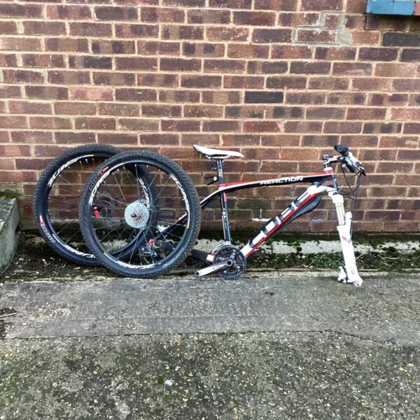 Side view of a Cube Reaction carbon fibre mountain bike.